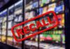 "Recall" stamp over blurred grocery store shelves.