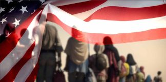 Line of people walking under American flag overlay.