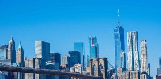 Brooklyn Bridge with Manhattan skyline in the background.