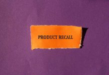 "Product Recall" text on orange paper, purple background.