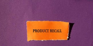 "Product Recall" text on orange paper, purple background.