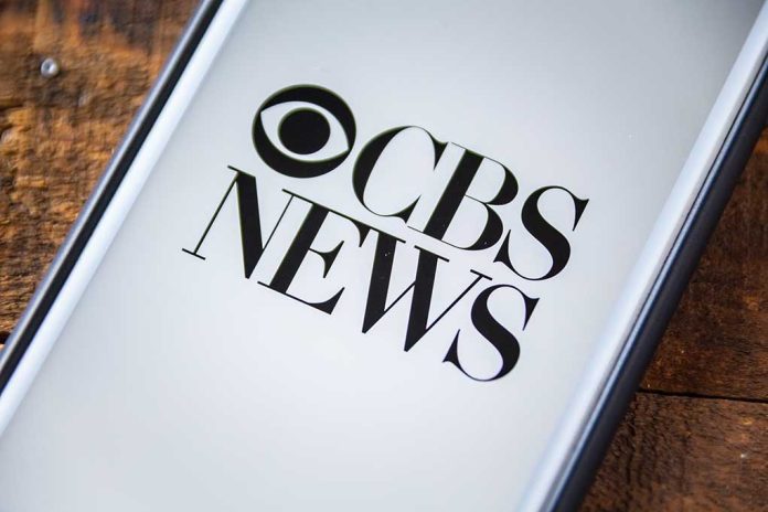 CBS News logo on a smartphone screen.