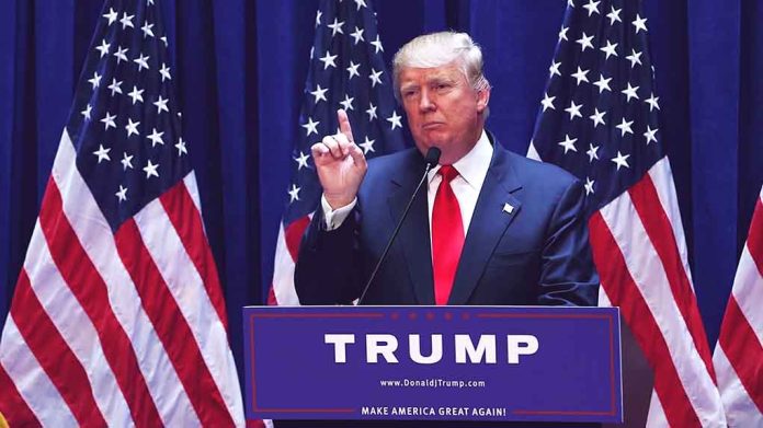 Person speaking at podium with multiple American flags.