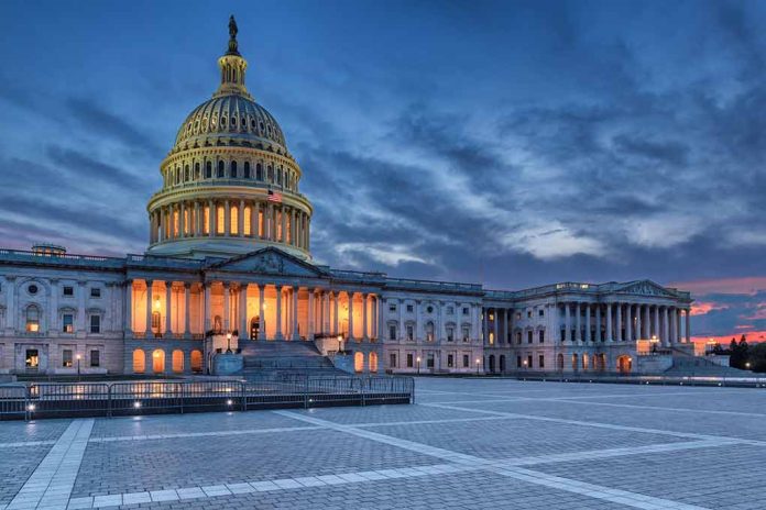 Capitol building illuminated against evening sky.