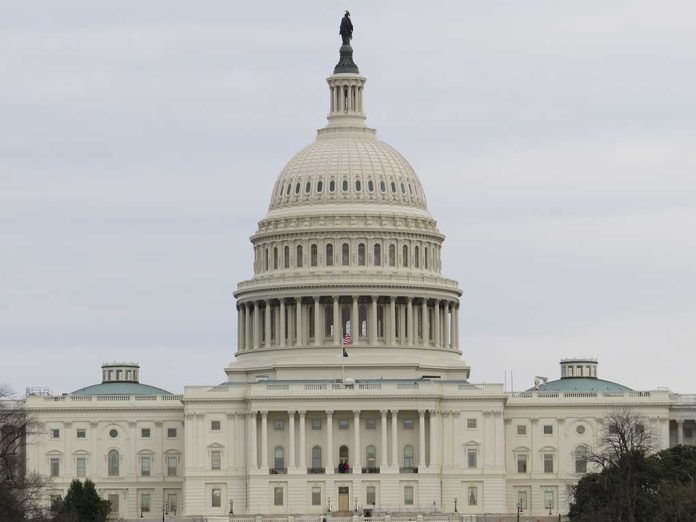 United States Capitol building under cloudy sky.