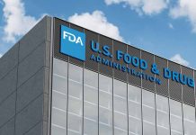 FDA building with blue logo and sky background.