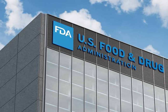 FDA building with blue logo and sky background.