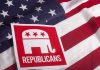 Red Republican elephant sign on U.S. flag.