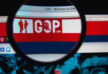 Magnifying glass over GOP website logo.