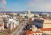 Washington, D.C. skyline with Capitol Building in background.