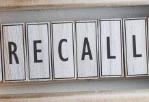 The word "RECALL" on wooden tiles.