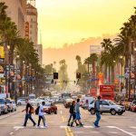 Busy street in Los Angeles at sunset.