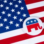 Republican elephant symbol on American flag background