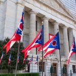 Ohio flags outside a government building.