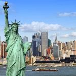 Statue of Liberty with New York City skyline.