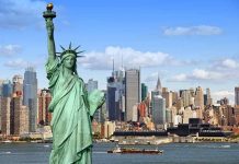 Statue of Liberty with New York City skyline.