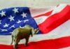 Elephant figurine on American flag background