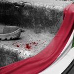 A boot next to blood and the Palestinian flag