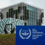 International Criminal Court building with sign in foreground.