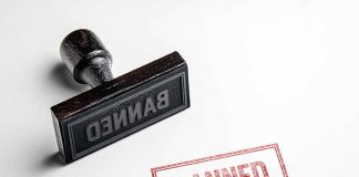 Black stamp next to red banned imprint