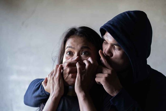 1381990856 featured image Man holding woman mouth gesturing silence