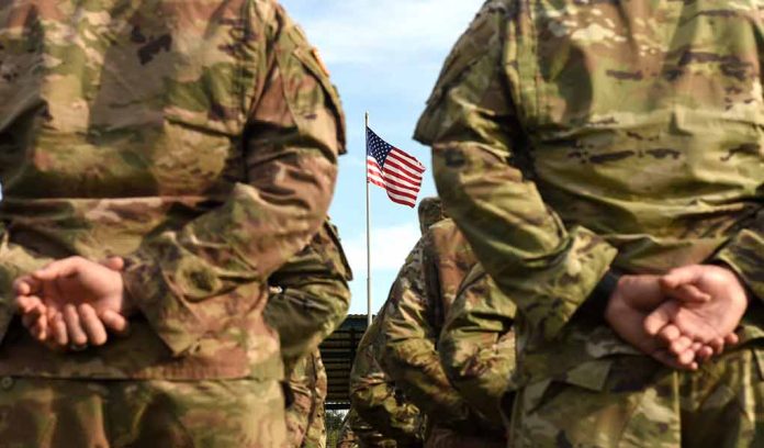 1507031819 featured image Soldiers stand in formation with American flag in background