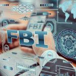 FBI letters with digital security graphics and hands