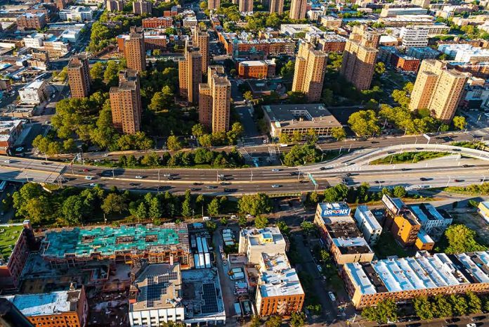 1660324648 featured image Aerial view of urban area with tall buildings and freeway