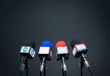 Microphones set up for a news conference