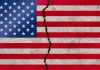 American flag with a large crack through it