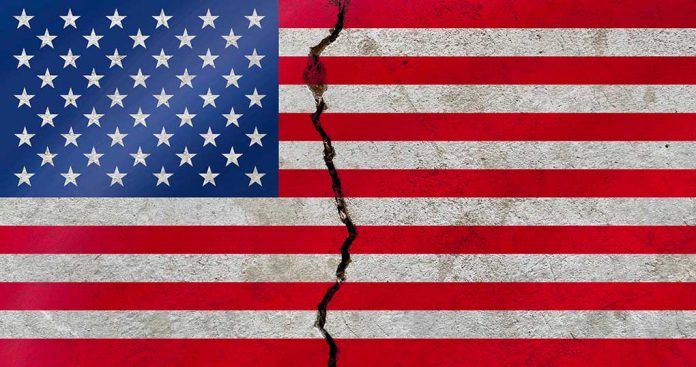 1841229298 featured image American flag with a large crack through it
