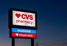 CVS pharmacy sign at evening sky background