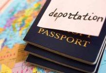 Passports stacked with deportation note on top
