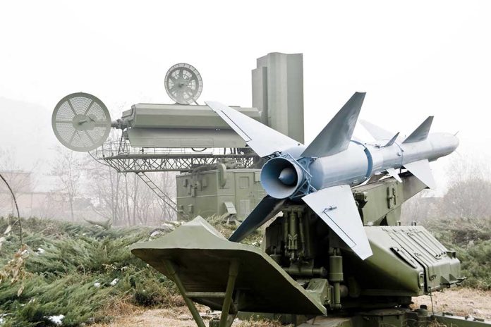 42426766 featured image Military missile launcher with radar systems in a foggy field
