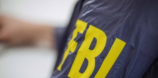 FBI jacket with yellow lettering
