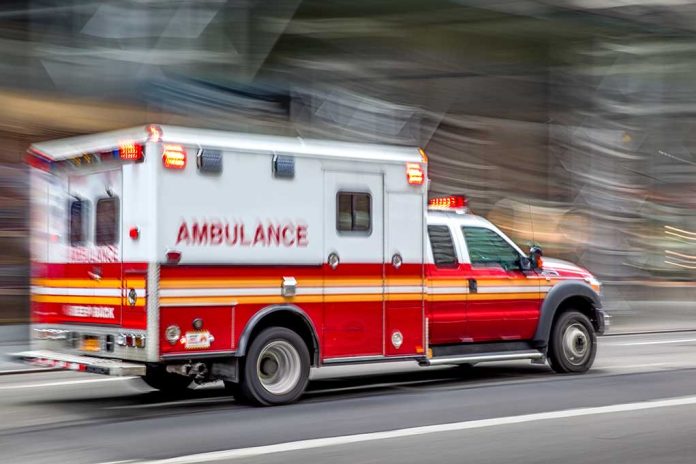 1495131698 featured image Red and white ambulance driving on street