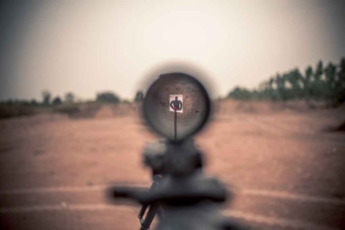 316081508 featured image Rifle scope aimed at a distant target outdoors