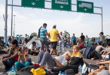 People sitting and resting on a highway