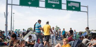 People sitting and resting on a highway