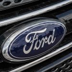 Ford logo on car grille close up