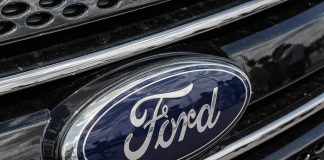 Ford logo on car grille close up