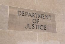 Department of Justice sign on a building
