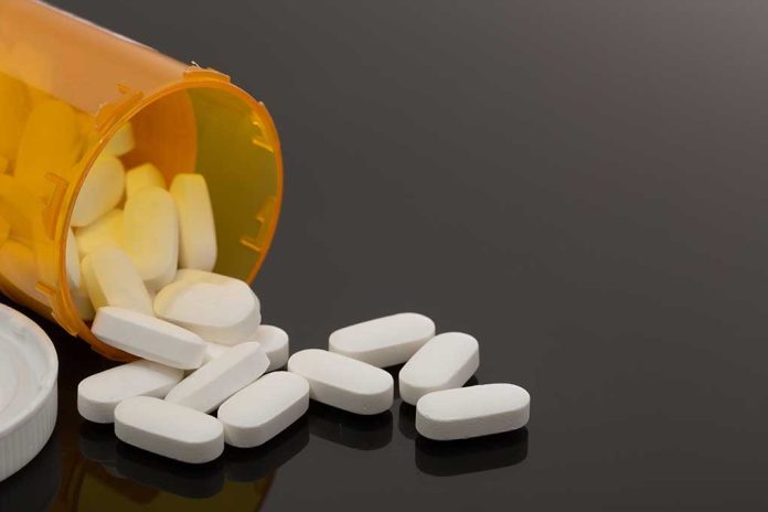 757565809 featured image Spilled prescription bottle with white pills