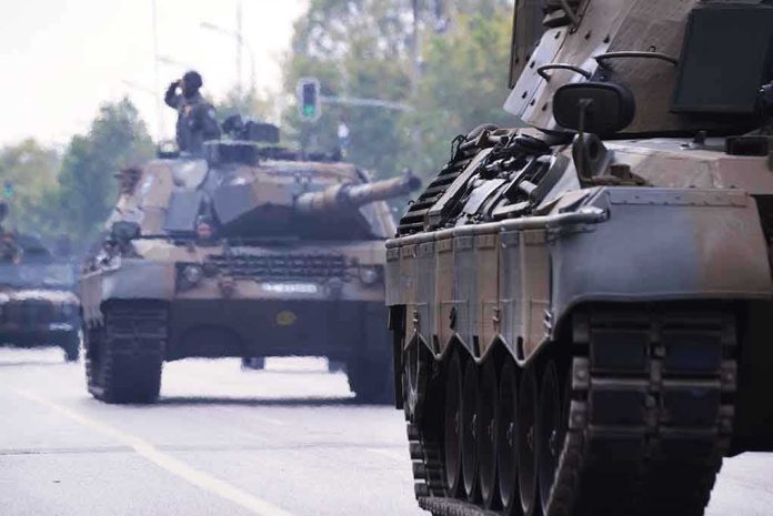 1200057271 Tanks on a road with soldiers inside