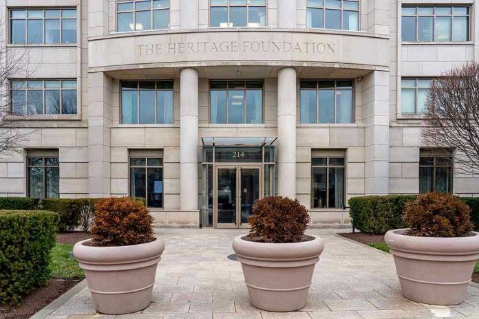 1698973735. Large building entrance with three potted plants