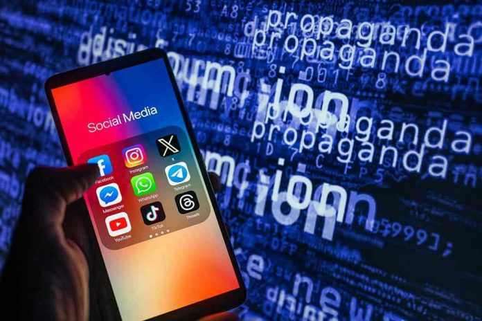 2378698417 Smartphone showing social media apps with text background