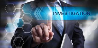 Man in suit pointing at Investigations text