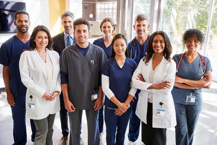 1133218364 Group of medical professionals in a hospital setting.