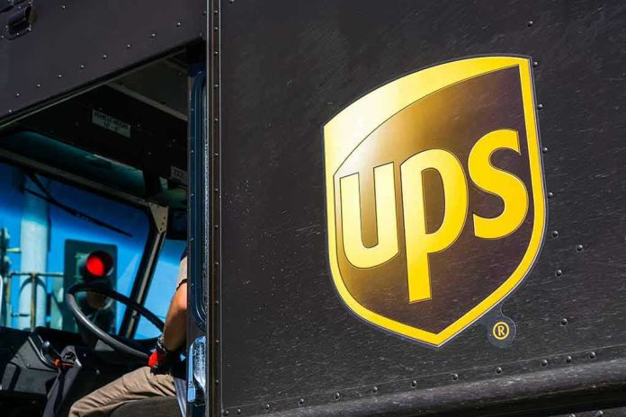 107331427 UPS delivery truck driver at traffic light
