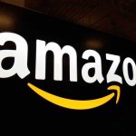 Amazon logo with a yellow smile arrow.